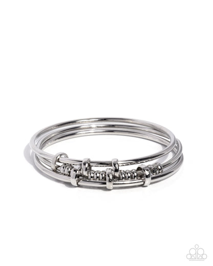 Glistening Guess - Silver Bangle Bracelets - Paparazzi Accessories
