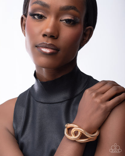 Interlocked Ignition - Gold Bracelet - Paparazzi Accessories