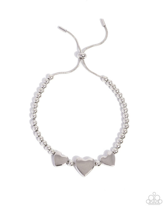 THRICE As Nice - Silver Slide, Heart Bracelet - Paparazzi Accessories