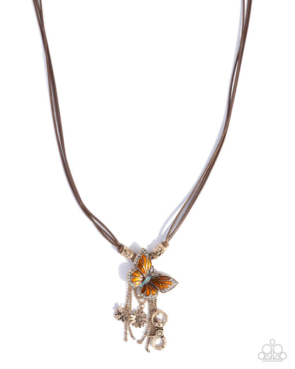 Whimsical World - Orange Enamel Silver Charms Brown Cord Lanyard Necklace - Paparazzi Accessories