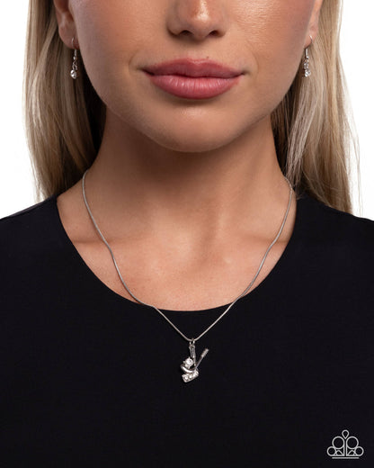 Hockey Game - White Rhinestone Hockey Stick Pendant Necklace - Paparazzi Accessories