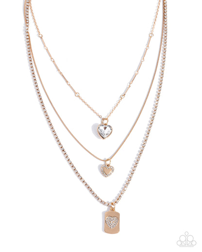 Romantic Rubato - Gold Layered White Rhinestone Necklace - Paparazzi Accessories