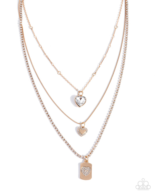 Romantic Rubato - Gold Layered White Rhinestone Necklace - Paparazzi Accessories