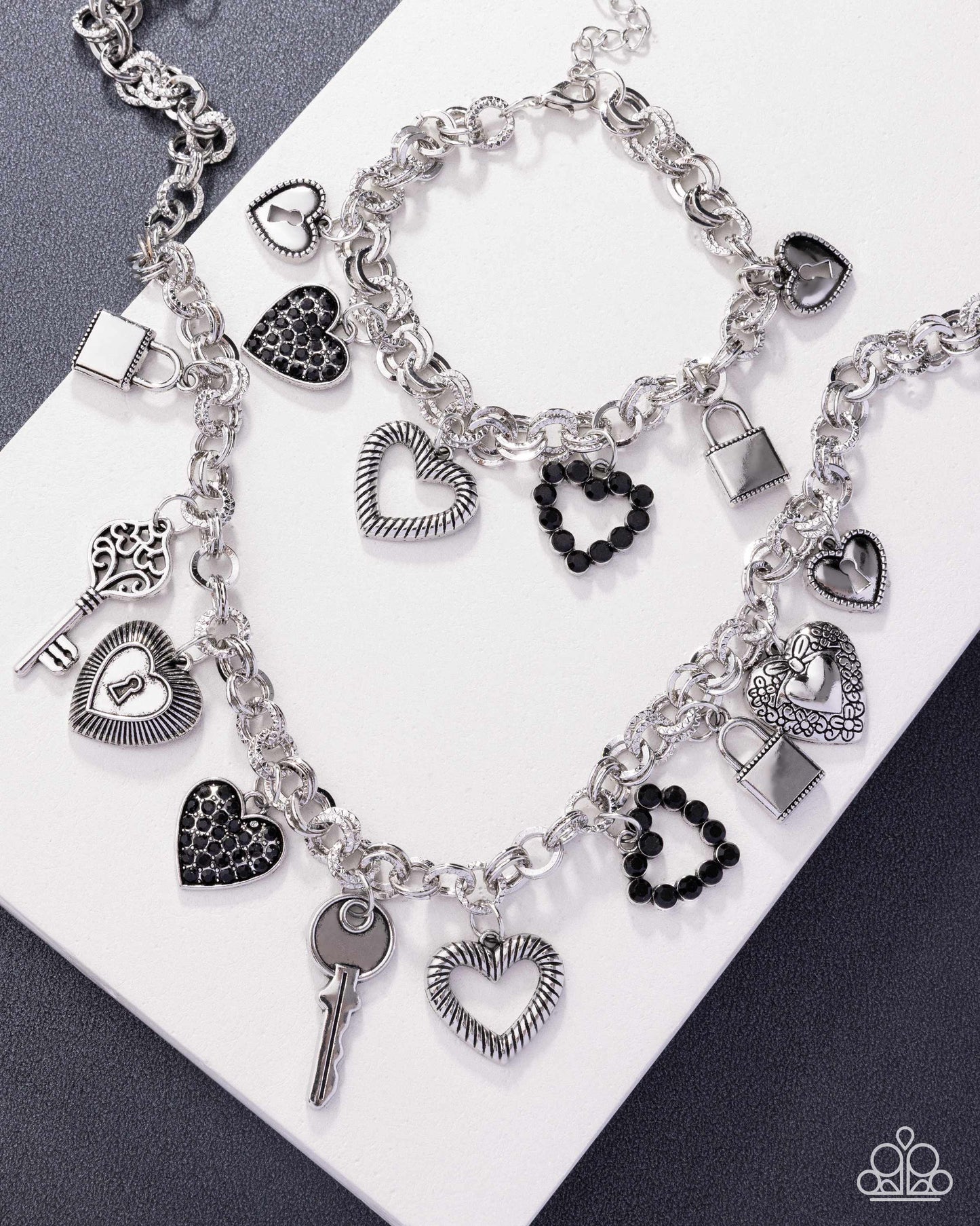 Intentional Influence - Complete Look - Black Rhinestone Silver Heart Charms - Paparazzi Accessories