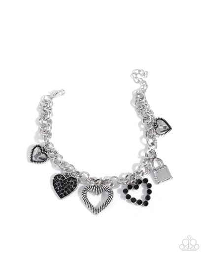 Intentional Influence - Complete Look - Black Rhinestone Silver Heart Charms - Paparazzi Accessories