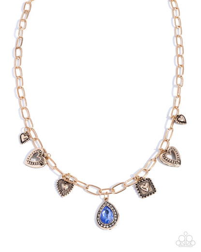 Flirtatious Framing - Blue Rhinestone Gold Neckalce - Paparazzi Accessories