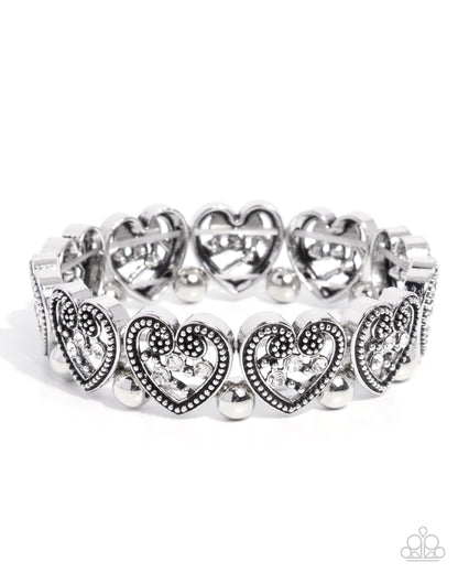 Historic Heartthrob - White Rhinestone Silver Stretchy Bracelet - Paparazzi Accessories