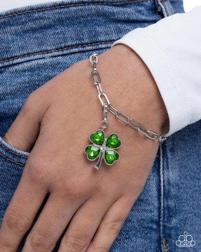 Lucky Luminescence - Green Rhinestone, Silver Clover Rhodium Plated Charm - Paparazzi Accessories