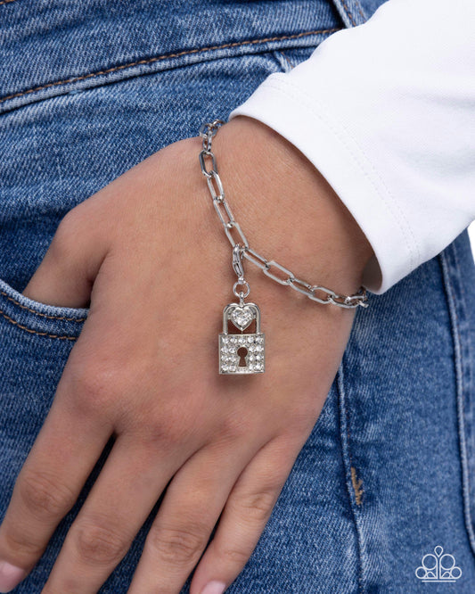 Committed Chic - White Rhinestone, Silver Lock Charm - Paparazzi Accessories