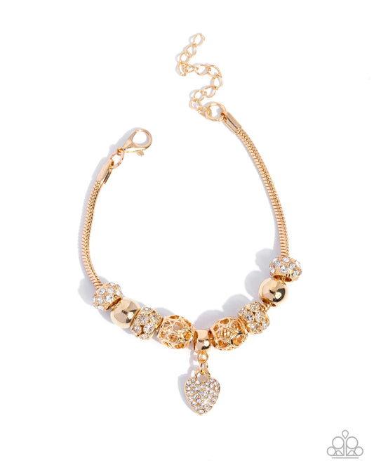 Romantic Roulette - Gold Charm Bracelet - Paparazzi Accessories
