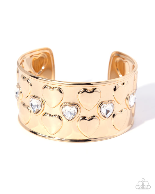 Loveable Labor - Gold and White Rhinestone Heart Cuff Bracelet - Paparazzi Accessories