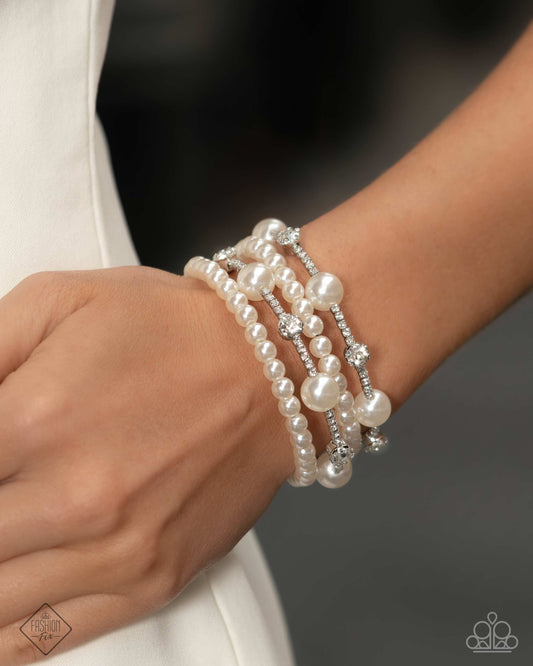 Adorably Amiable - White Coil Bracelet - Fiercely 5th Avenue April 2025 - Paparazzi Accessories