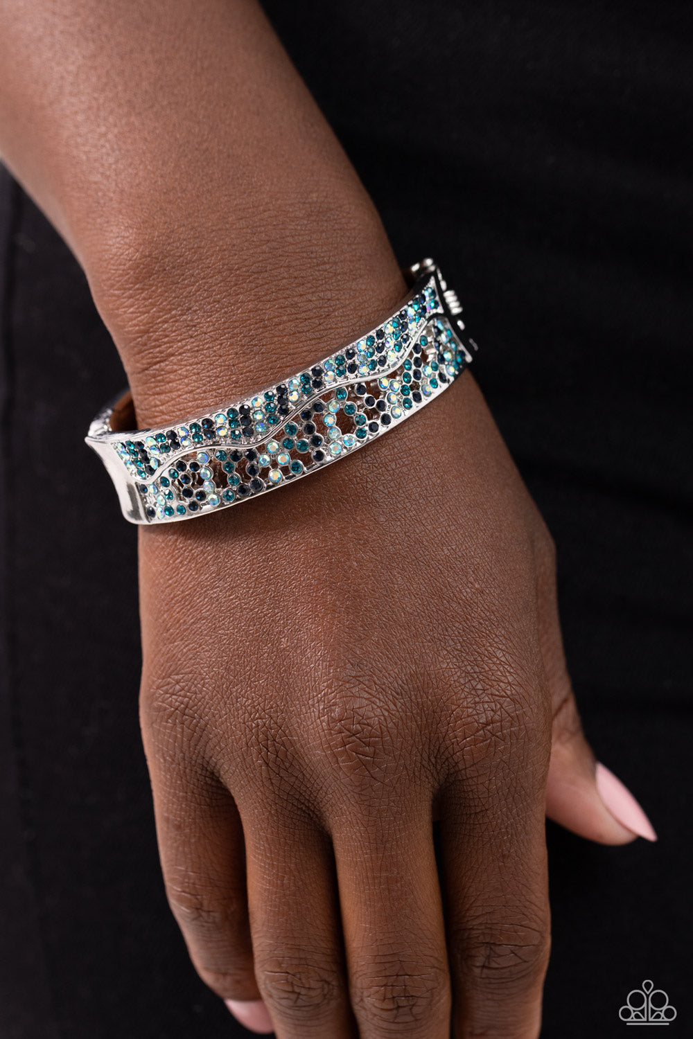 Wavy Whimsy - Blue Iridescent Rhinestone Hinge Bracelet - Paparazzi Accessories