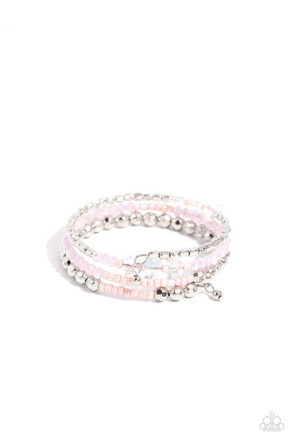 Boundless Behavior - Pink Butterfly Coil Bracelet - Paparazzi Accessories