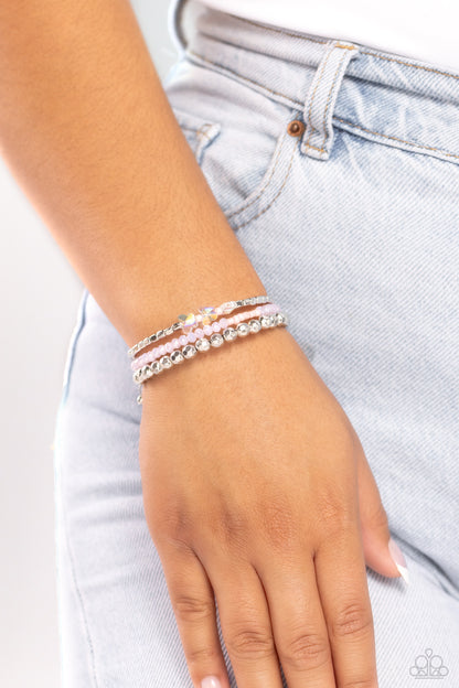 Boundless Behavior - Pink Butterfly Coil Bracelet - Paparazzi Accessories