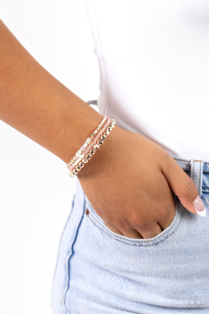 Boundless Behavior - Rose Gold - Iridescent Butterfly Crystal Coil Bracelet - Paparazzi Accessories